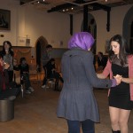 Students learn a few bachata steps